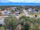 Aerial view of neighborhood, showcasing houses and surrounding landscape at 3054 Shallowford St, Deltona, FL 32738