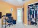 Bedroom with workspace, large closet, and view of additional room at 3054 Shallowford St, Deltona, FL 32738