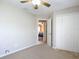 Well-lit bedroom with access to another room and double door closet at 3054 Shallowford St, Deltona, FL 32738