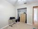 Bedroom with a workspace, dresser, and closet at 3054 Shallowford St, Deltona, FL 32738