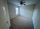 Bright bedroom with neutral walls and carpeted floor at 3054 Shallowford St, Deltona, FL 32738