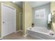 Bathroom with garden tub and shower at 308 Willowbay Ridge St, Sanford, FL 32771