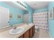 Shared bathroom with double vanity at 308 Willowbay Ridge St, Sanford, FL 32771