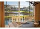 Dining area with view of pool and pond at 308 Willowbay Ridge St, Sanford, FL 32771