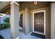 Inviting front entry with dark brown door and sidelights at 308 Willowbay Ridge St, Sanford, FL 32771