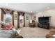 Relaxing living room featuring comfortable brown leather seating and a large window at 308 Willowbay Ridge St, Sanford, FL 32771