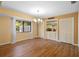 Bright dining room with hardwood floors and built-in wet bar at 360 Gleneagles Dr, New Smyrna Beach, FL 32168