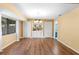 Bright dining room with hardwood floors and built-in wet bar at 360 Gleneagles Dr, New Smyrna Beach, FL 32168