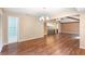 Bright dining room with wood floors and built-in bar at 360 Gleneagles Dr, New Smyrna Beach, FL 32168