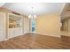 Bright dining room with wood floors and built-in bar at 360 Gleneagles Dr, New Smyrna Beach, FL 32168