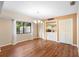 Bright dining room with wood floors and built-in bar at 360 Gleneagles Dr, New Smyrna Beach, FL 32168