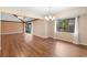 Bright dining room with wood floors and built-in bar at 360 Gleneagles Dr, New Smyrna Beach, FL 32168