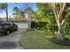 Single-story house with attached garage and lush landscaping at 360 Gleneagles Dr, New Smyrna Beach, FL 32168