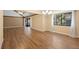 Bright living room with wood floors and sliding glass doors at 360 Gleneagles Dr, New Smyrna Beach, FL 32168