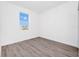 Empty bedroom with wood-look floors and window at 368 Famagusta Dr, Davenport, FL 33896