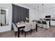 Modern dining room with marble table and grey chairs at 368 Famagusta Dr, Davenport, FL 33896