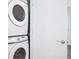 Stackable Samsung washer and dryer in a bright laundry room at 368 Famagusta Dr, Davenport, FL 33896