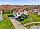 Two-story house with a red roof and large backyard in a residential neighborhood at 413 Country Cottage Ln, Winter Garden, FL 34787