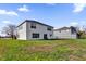 Large backyard with grassy lawn at 413 Country Cottage Ln, Winter Garden, FL 34787