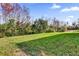 Private backyard with lush greenery at 413 Country Cottage Ln, Winter Garden, FL 34787