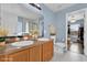 Bathroom featuring double sinks and a walk-in closet at 413 Country Cottage Ln, Winter Garden, FL 34787