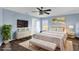 Comfortable bedroom featuring contemporary furnishings and decor at 413 Country Cottage Ln, Winter Garden, FL 34787