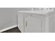 Convenient laundry room with modern washer and dryer units at 413 Country Cottage Ln, Winter Garden, FL 34787