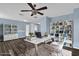 Bright home office featuring modern decor and a stylish ceiling fan at 413 Country Cottage Ln, Winter Garden, FL 34787