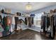 Large walk-in closet with ample hanging space and shelving at 413 Country Cottage Ln, Winter Garden, FL 34787