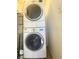 Stackable washer and dryer in a dedicated laundry closet at 429 Fountainhead Cir # 122, Kissimmee, FL 34741