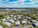 Condo community near a lake with many trees at 4409 Prairie Ct # A, Orlando, FL 32808