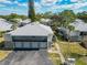 Aerial view of townhouses and surrounding landscape at 4409 Prairie Ct # A, Orlando, FL 32808