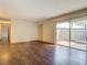 Living room with patio access and wood-look floors at 4409 Prairie Ct # A, Orlando, FL 32808