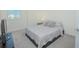 Comfortable bedroom with a double bed and a wall-mounted TV at 4708 Tribute Trl, Kissimmee, FL 34746