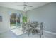 Bright dining area with sliding glass doors to the backyard at 4708 Tribute Trl, Kissimmee, FL 34746