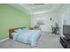 Spacious main bedroom with a desk and seating area at 4708 Tribute Trl, Kissimmee, FL 34746