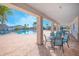 Resort-style pool with covered seating area at 4708 Tribute Trl, Kissimmee, FL 34746