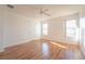 Bright bedroom with wood floors and ceiling fan at 4712 Hemingway House St, Kissimmee, FL 34746