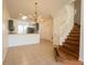 Open dining room with chandelier and view of kitchen at 4712 Hemingway House St, Kissimmee, FL 34746