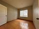 Bright bedroom with tile floors and a window providing natural light at 4865 Cypress Woods Dr # 2109, Orlando, FL 32811