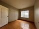 Bright bedroom with tile flooring and a window at 4865 Cypress Woods Dr # 2109, Orlando, FL 32811