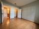 Bedroom with tile floors and access to bathroom and closet at 4865 Cypress Woods Dr # 2109, Orlando, FL 32811