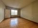 Bright bedroom featuring tile floors and a window at 4865 Cypress Woods Dr # 2109, Orlando, FL 32811