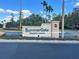 SummerGate Condominiums entrance sign and landscaping at 4865 Cypress Woods Dr # 2109, Orlando, FL 32811