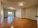 Spacious living room featuring tile floors and access to a patio at 4865 Cypress Woods Dr # 2109, Orlando, FL 32811