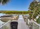 Private boat dock with access to water and space for pontoon boat at 5 Riverwalk Dr # 301, New Smyrna Beach, FL 32169