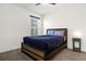 Cozy bedroom with a double bed and nightstand at 5372 Palomino Pl, Apopka, FL 32712