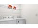 Convenient laundry room with Whirlpool washer and dryer at 5372 Palomino Pl, Apopka, FL 32712