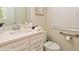 Clean bathroom with single vanity and walk-in shower at 5452 Misty Oak Cir, Davenport, FL 33837