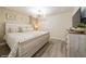 Main bedroom with king-size bed and elegant decor at 5452 Misty Oak Cir, Davenport, FL 33837